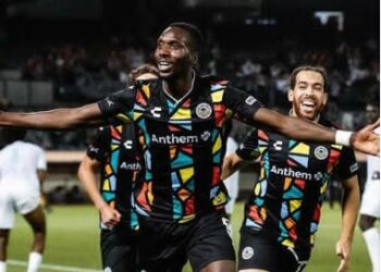 Liberian striker Peter Wilson celebrates after scoring for Oakland Roots during his Golden Boot-winning season in the USL Championship