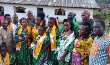 Graduates of Forpoh Vocational Institute pose with officials and instructors during the school’s first graduation ceremony in Grand Kru County, Liberia