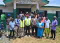 LERC Commissioners and participants gather outside the Bomi Youth Resource Center after a public hearing on LEC’s proposed electricity tariff adjustments