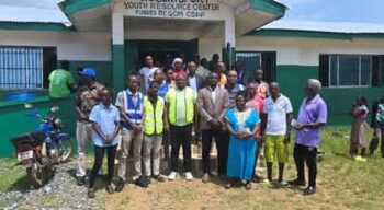 LERC Commissioners and participants gather outside the Bomi Youth Resource Center after a public hearing on LEC’s proposed electricity tariff adjustments