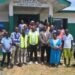 LERC Commissioners and participants gather outside the Bomi Youth Resource Center after a public hearing on LEC’s proposed electricity tariff adjustments