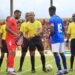Liberia and Equatorial Guinea captains exchange flags before kickoff at the Estadio de Malabo during their final 2026 World Cup qualifying match