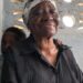 An elderly woman weeps as residents of the Hotel Africa community in Lower Virginia face mass eviction under a government land reclamation order