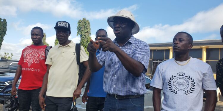 Abraham Barbour, administrator of Kargboyah Estate, addresses reporters outside the Temple of Justice, rejecting Edwin Urey’s land claim and citing a Supreme Court ruling