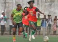 Players from Determine Girls and Shaita Angels battle for the ball during a previous LFA Women’s League match in Monrovia