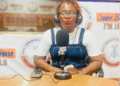 Bong County Superintendent Hawa Loleyah Norris addresses the media in Gbarnga, accusing Musa Bility of disrespecting her office and bypassing county authorities over a $500,000 bridge project