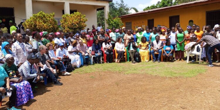 Officials and community members gather in Frank Town, Careysburg, for the mid-term review of the Liberia Women Empowerment Project supported by the World Bank