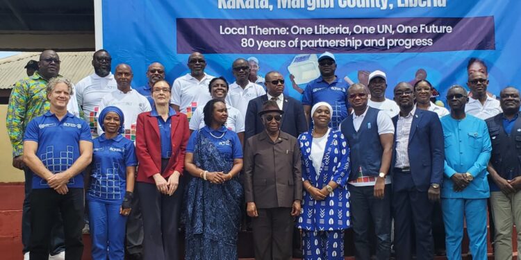 President Joseph N. Boakai poses with UN Resident Coordinator Christine Umutoni and other dignitaries at the UN@80 celebration in Kakata, Margibi County