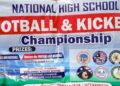 A banner for Liberia’s National High School Football & Kickball Championship displayed at a tournament venue where C.H. Dewey High School was sanctioned after a referee attack.