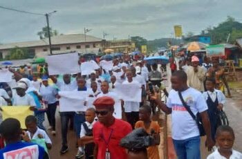 Residents of Harper, Maryland County, march in support of Liberia’s national “Say No to Drugs” campaign amid concerns over weak law enforcement capacity.