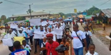Residents of Harper, Maryland County, march in support of Liberia’s national “Say No to Drugs” campaign amid concerns over weak law enforcement capacity.