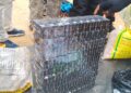 Stacks of seized Tramadol packs displayed by LDEA officers in Nimba County following a major anti-drug operation on the Yekepa-Sanniquillie highway