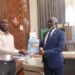 Integrity Watch Liberia Executive Director Harold Aidoo presents the 2026 Budget Option Paper to House Speaker Richard Koon at the Capitol Building in Monrovia.