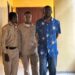 Pastor Jenkins Johnson escorted by court officers at the Temple of Justice amid allegations of impregnating a congregant’s wife in Liberia.