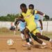 Youth football players competing during regional AML Cup district matches in Liberia