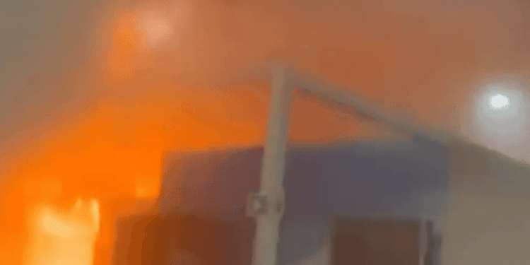 Fire trucks and smoke at COP30 venue in Belém as emergency crews respond to a fire in Zone B during the global climate conference
