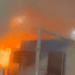 Fire trucks and smoke at COP30 venue in Belém as emergency crews respond to a fire in Zone B during the global climate conference