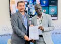 EPA Executive Director Dr. Emmanuel K. Urey Yarkpawolo and UNICEF’s Gernot Laganda sign the Declaration on Children, Youth, and Climate Action at COP30 in Belém, Brazil.
