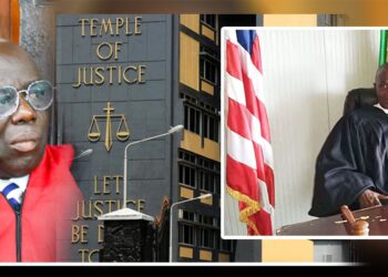 Liberian Chief Justice Yarmie Q. Gbeisay seated in court wearing judicial robes during a Supreme Court session in Monrovia.