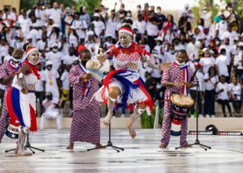 Traditional Liberian performers showcasing cultural heritage during a public celebration