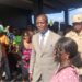 Nelsco Aleo Wolo walks among supporters after Senate confirmation as LIS Deputy Commissioner