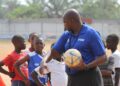 FIFA Talent Coach Ammy Ninje instructs young Liberian footballers during a youth training session in Monrovia