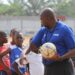 FIFA Talent Coach Ammy Ninje instructs young Liberian footballers during a youth training session in Monrovia