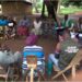 Members of the AHWEHDE Farmers Association meet with ActionAid Liberia’s assessment team during the SADFONS project impact review in Dougee Town, Grand Gedeh County.