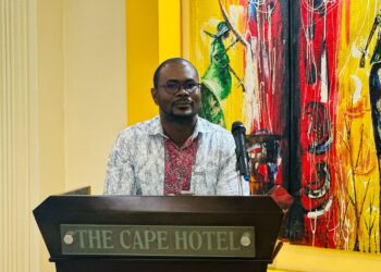 Dominic T. Johns, Team Lead of Champions for Change, delivers remarks at the Liberia National Forest Forum 2025 at the Cape Hotel in Monrovia.
