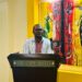 Dominic T. Johns, Team Lead of Champions for Change, delivers remarks at the Liberia National Forest Forum 2025 at the Cape Hotel in Monrovia.