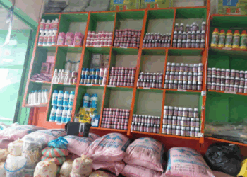 Shelves of seeds, farm chemicals, and feed supplies displayed at Agro Power’s new outlet in Kakata.