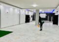 Renovated DILISS auditorium redesigned by Bestman Consult, featuring modern lighting and architectural finishes