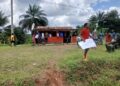 Protesters in Yarpah Town hold placards demanding financial accountability in River Cess County.