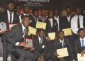 Starz University students and honorees pose with academic and humanitarian awards during the 2025 honors and awards ceremony in Paynesville.
