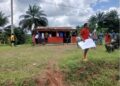 Protesters gather in Yarpah Town, River Cess County, demanding accountability from Superintendent Byron Zahnwea over alleged budget discrepancies.