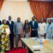 LERC officials and LEC representatives pose after signing the amended electricity distribution license