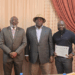 LERC Board members presenting Liberia’s first solar PV installer license to Mark McCauley