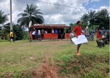 Protesters gather in Yarpah Town, River Cess County, demanding accountability from Superintendent Byron Zahnwea over alleged budget discrepancies.