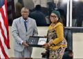 Liberia’s Foreign Minister Sara Beysolow Nyanti and ECOWAS Court President Ricardo Cláudio Monteiro Gonçalves exchange documents during the official visit in Monrovia reaffirming Liberia’s commitment to regional justice cooperation.