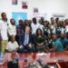 Deputy Minister Garmai Tokpah and partners pose with students and child advocates during the launch of Liberia’s 2025 World Children’s Day celebration in Monrovia.