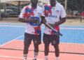 Liberia’s pickleball doubles team posing on court during the West Africa Regional Pickleball Tournament in Ghana