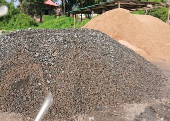 Piles of sand and crushed rocks donated to support the New Kru Town community bridge project linking Trowin and Mombo Towns.