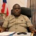 Grand Bassa County Representative Matthew Joe seated at his desk during budget discussion.