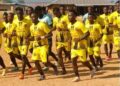 Bea Mountain FC players enter the pitch before a match in Grand Cape Mount County, days before the LFA sanctioned the club for crowd violence