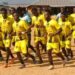 Bea Mountain FC players enter the pitch before a match in Grand Cape Mount County, days before the LFA sanctioned the club for crowd violence