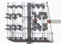 Technicians install new floodlights at the SKD Sports Complex during the renovation works.