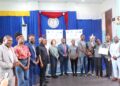 Liberian fisheries officials, EU Ambassador Nona Deprez, and university students pose during the launch of the 2025 World Fisheries Day debate at the University of Liberia.