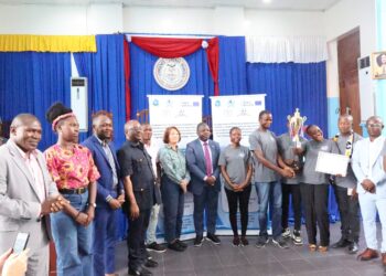 Liberian fisheries officials, EU Ambassador Nona Deprez, and university students pose during the launch of the 2025 World Fisheries Day debate at the University of Liberia.
