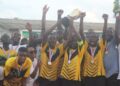 Mount Zion Christian Academy players celebrate winning football and kickball championships at the inaugural “Who Owns 72nd” tournament in Monrovia.