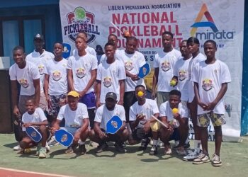 Group photo of Liberian pickleball players at Invincible Sports Park during the first national pickleball tournament in Monrovia, Liberia.